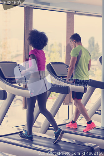 Image of people exercisinng a cardio on treadmill