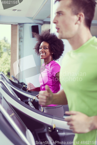 Image of people exercisinng a cardio on treadmill in gym