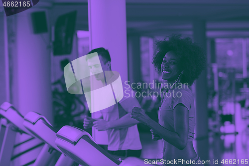 Image of people exercisinng a cardio on treadmill