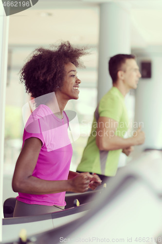 Image of people exercisinng a cardio on treadmill