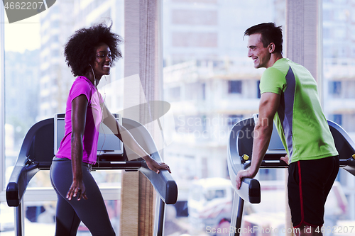 Image of people exercisinng a cardio on treadmill