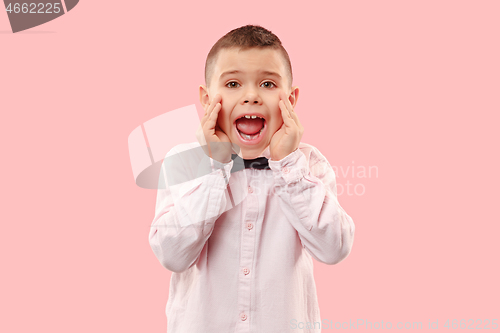 Image of Isolated on pink young casual boy shouting at studio