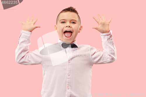 Image of Winning success boy happy ecstatic celebrating being a winner. Dynamic energetic image of male model