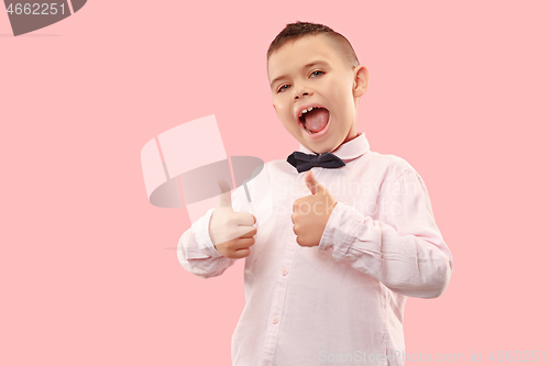 Image of Isolated on pink young casual boy shouting at studio