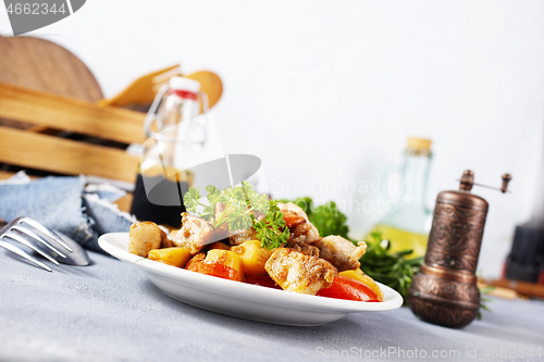 Image of fried meat with vegetbales