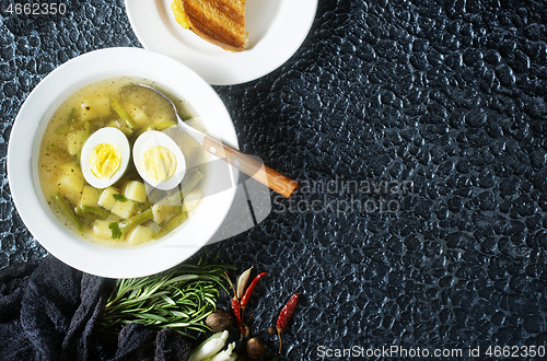 Image of soup with vegetables and egg