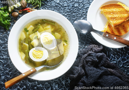 Image of soup with vegetables and egg