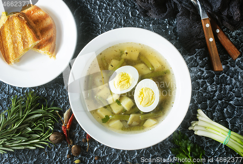 Image of soup with vegetables and egg