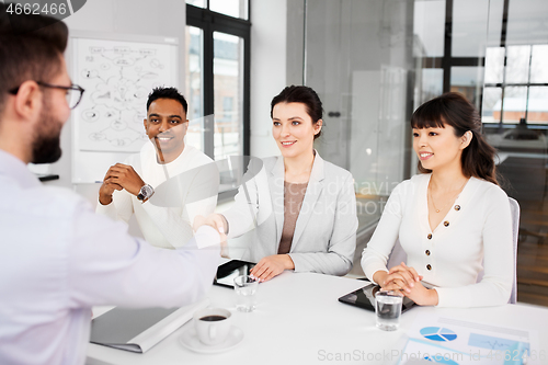 Image of recruiters having interview with employee