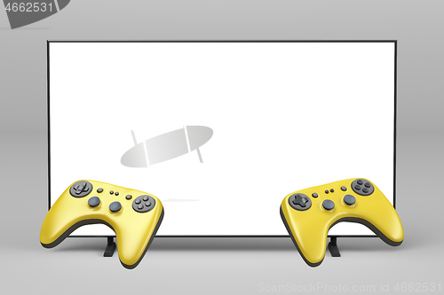 Image of Gaming controllers and TV with empty screen