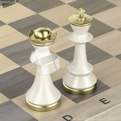 Image of Queen and king chess pieces on chess board