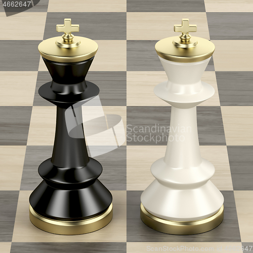 Image of Chess kings on wooden chessboard