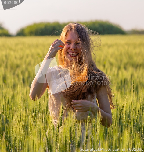 Image of Portrait of a laughing girl with matted hair