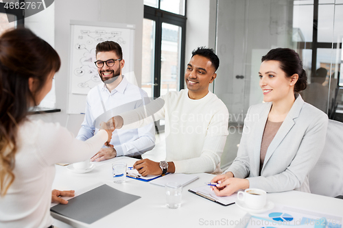 Image of recruiters having interview with employee