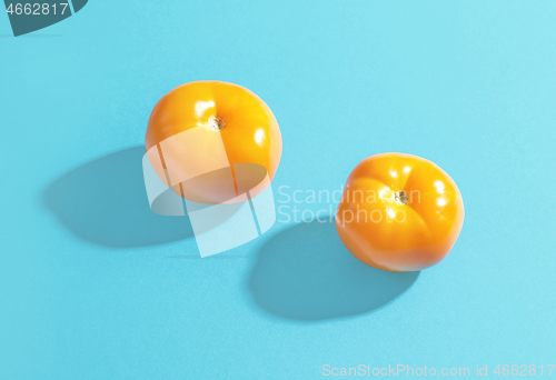 Image of two yellow tomatoes