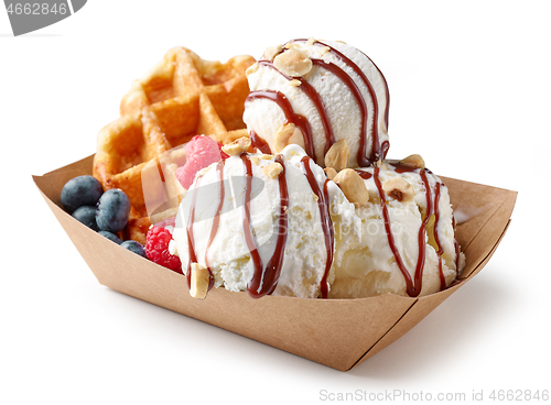 Image of belgian waffle with fresh berries and vanilla ice cream