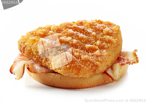 Image of burger bread with fried chicken and bacon