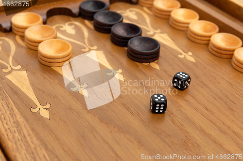 Image of Dice on a backgammon board