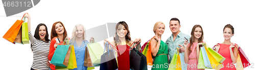 Image of asian woman with shopping bags and people