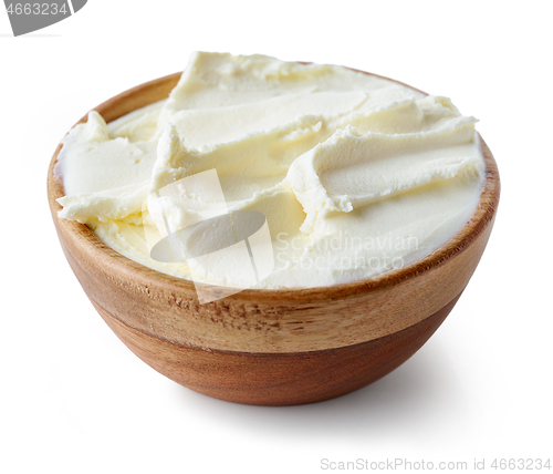 Image of cream cheese in wooden bowl