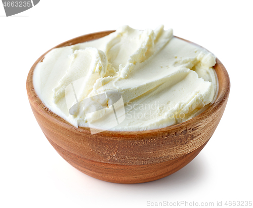 Image of cream cheese in wooden bowl