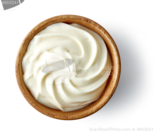 Image of cream cheese in wooden bowl