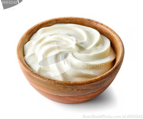 Image of cream cheese in wooden bowl