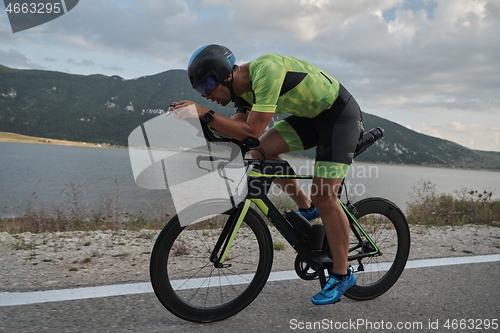 Image of triathlon athlete riding bike