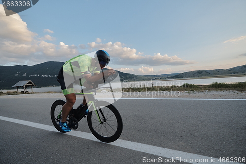 Image of triathlon athlete riding bike