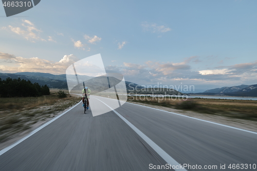 Image of triathlon athlete riding bike