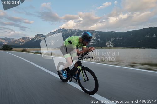 Image of triathlon athlete riding bike