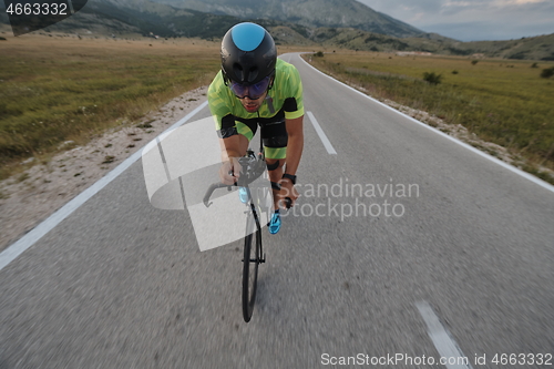 Image of triathlon athlete riding bike