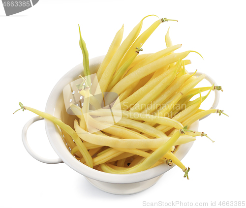 Image of yellow beans in white colander