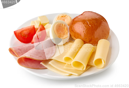 Image of plate of cheese and ham sausage