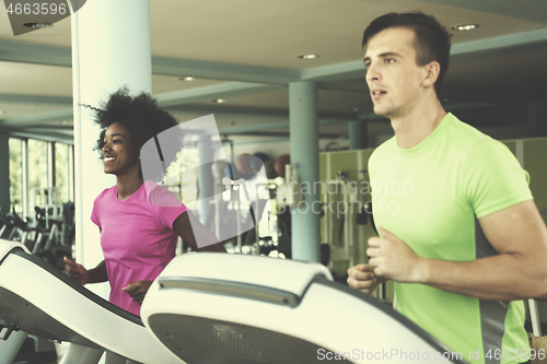 Image of people exercisinng a cardio on treadmill in gym