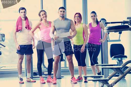 Image of Group of people exercising at the gym