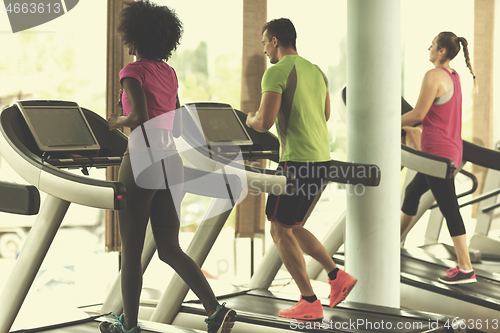 Image of people exercisinng a cardio on treadmill