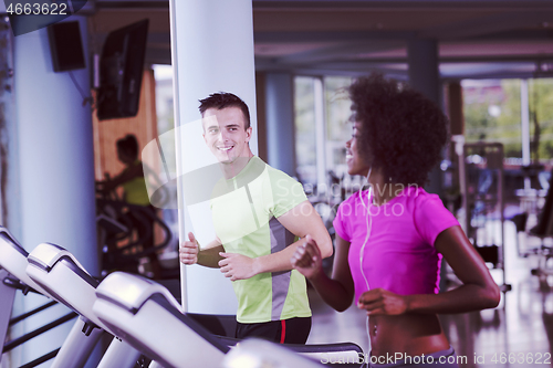 Image of people exercisinng a cardio on treadmill