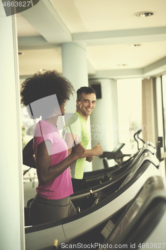 Image of people exercisinng a cardio on treadmill in gym