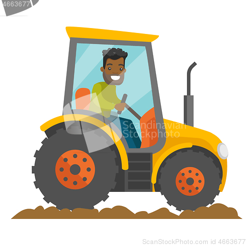 Image of A black happy farmer in tractor on a rural farm field.