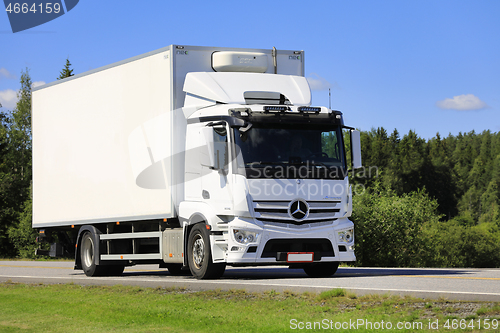 Image of White Mercedes-Benz Truck on Road