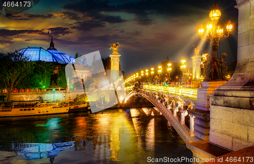 Image of Bridge in Paris at night