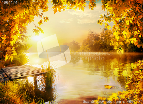 Image of Wooden pier by river