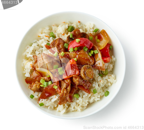 Image of fried rice and vegetables with hot chicken sauce