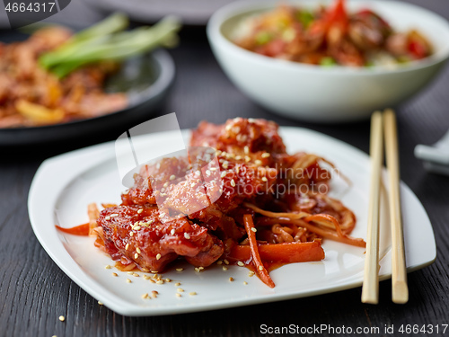 Image of plate of fried meat in teriyaki sauce