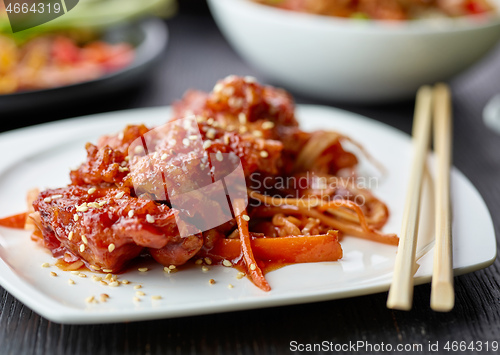 Image of plate of fried meat in teriyaki sauce