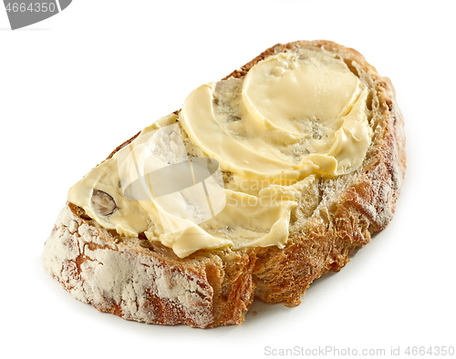 Image of slice of bread with butter