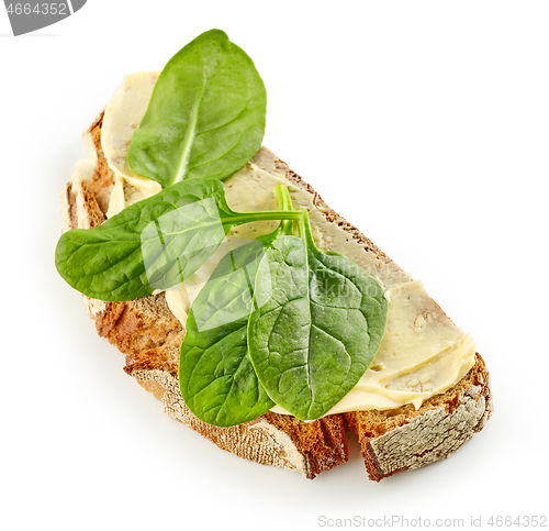 Image of breakfast sandwich with spinach leaves