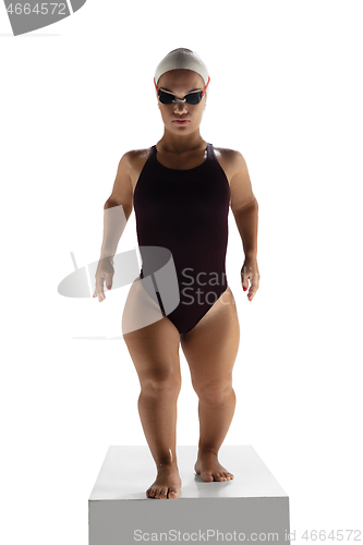 Image of Beautiful dwarf woman practicing in swimming isolated on white background