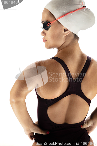 Image of Beautiful dwarf woman practicing in swimming isolated on white background